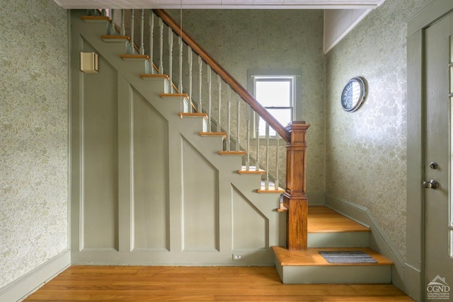 2 W Marie St, Hudson, NY 12534 - stairs featuring wallpapered walls and wood finished floors