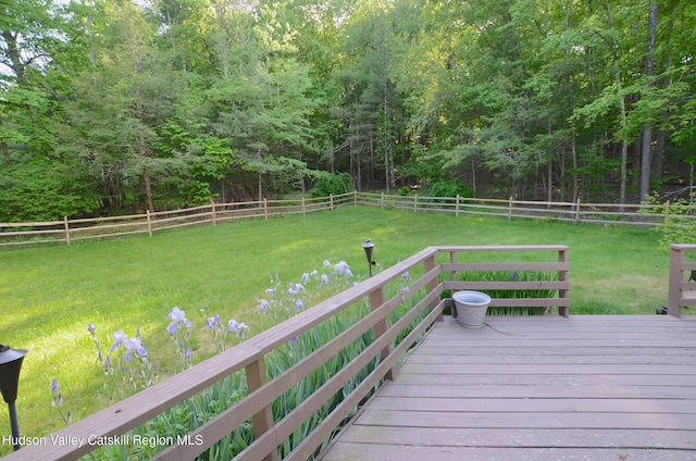 deck featuring a lawn