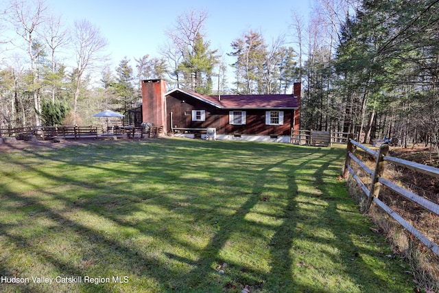 exterior space with a lawn