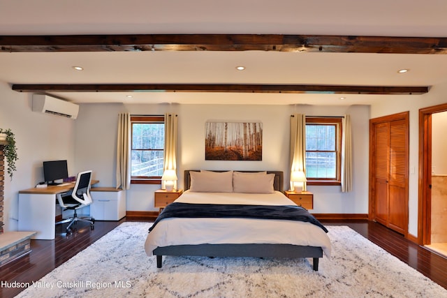 bedroom featuring beamed ceiling, dark hardwood / wood-style flooring, an AC wall unit, and a closet