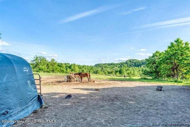 view of play area with a rural view