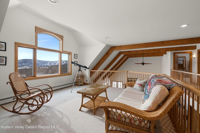 living area with a mountain view, carpet floors, ceiling fan, and lofted ceiling