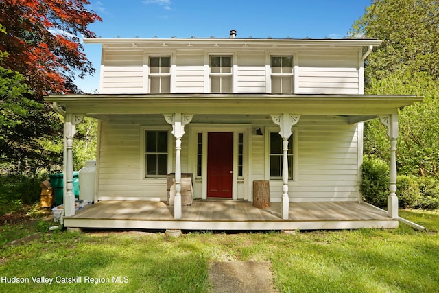 1130 Sawkill Rd, Kingston, NY 12401 - view of front facade featuring covered porch and a front yard
