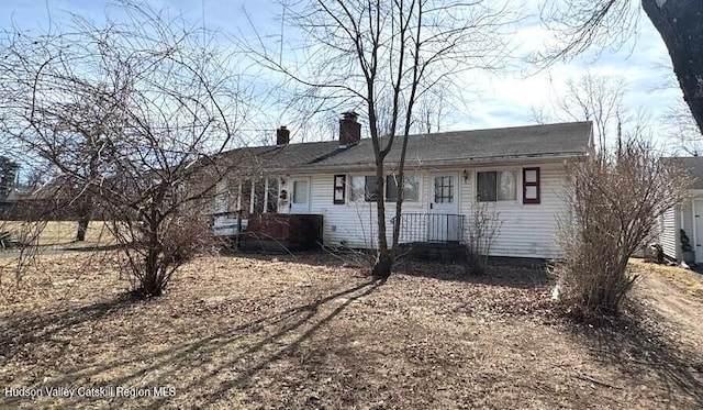 view of front of property with a chimney