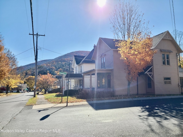 view of side of property featuring a mountain view