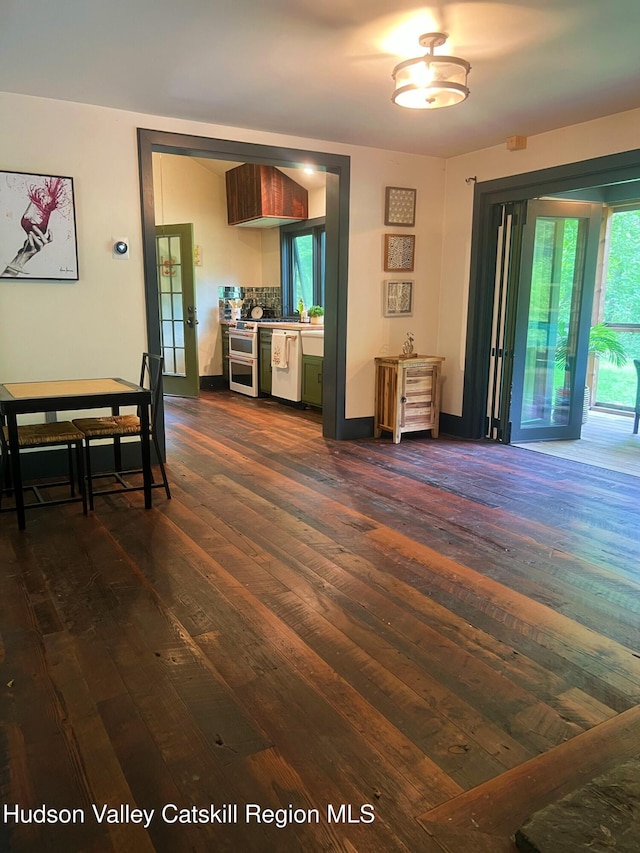 36 Rodney St, Kingston, NY 12401 - living area with dark wood-style floors and baseboards