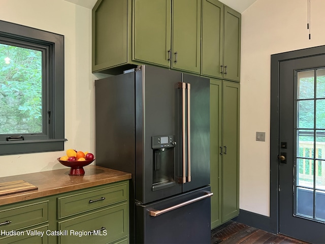 36 Rodney St, Kingston, NY 12401 - kitchen with green cabinets, high end fridge, butcher block countertops, and dark wood-style floors