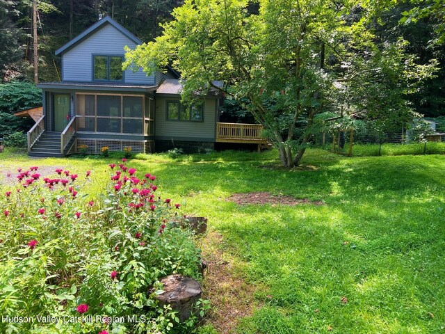 36 Rodney St, Kingston, NY 12401 - back of house with a sunroom, a yard, and a deck