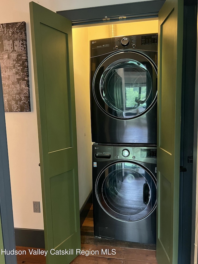 36 Rodney St, Kingston, NY 12401 - laundry room with estacked washer and dryer and dark wood-style flooring