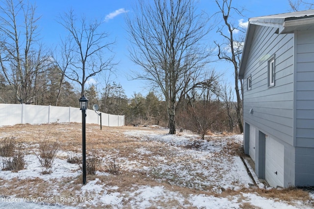 1920 Old Kings Hwy, Saugerties, NY 12477 - yard covered in snow with an attached garage and fence