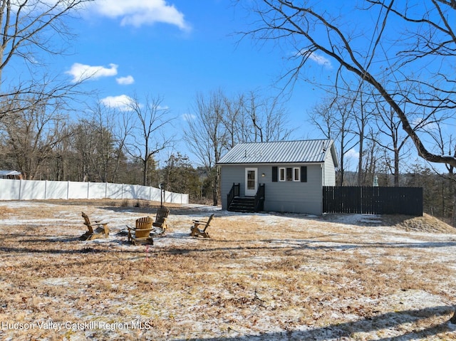 1920 Old Kings Hwy, Saugerties, NY 12477 - snow covered house featuring entry steps, metal roof, and fence