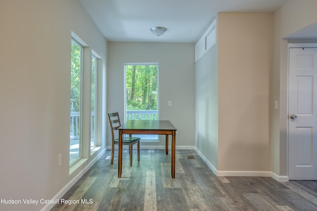 186 2nd St, Port Ewen, NY 12417 - unfurnished dining area featuring wood finished floors and baseboards