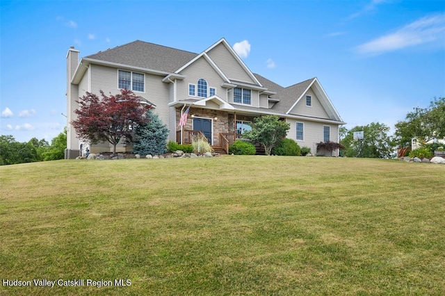 10 Sutton Ln, Goshen, NY 10924 - view of front of house with a front yard, a porch, and a chimney