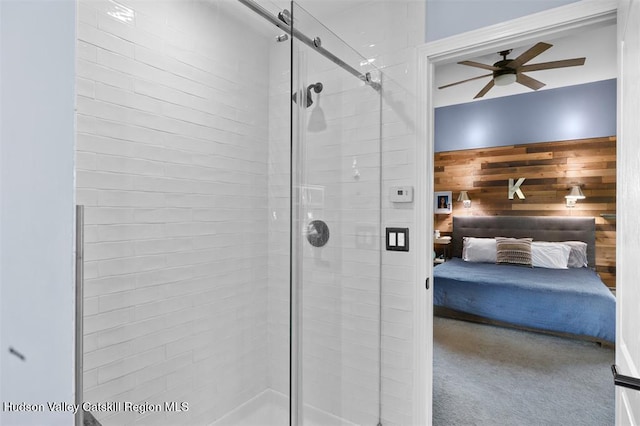 10 Sutton Ln, Goshen, NY 10924 - full bathroom featuring ensuite bathroom, a stall shower, ceiling fan, and wooden walls