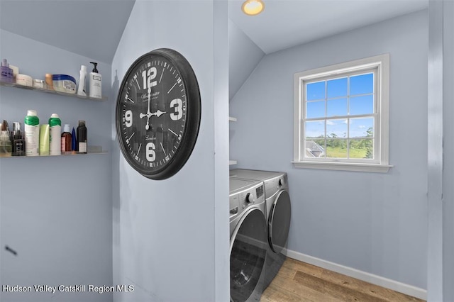 10 Sutton Ln, Goshen, NY 10924 - laundry room featuring washing machine and dryer and wood finished floors