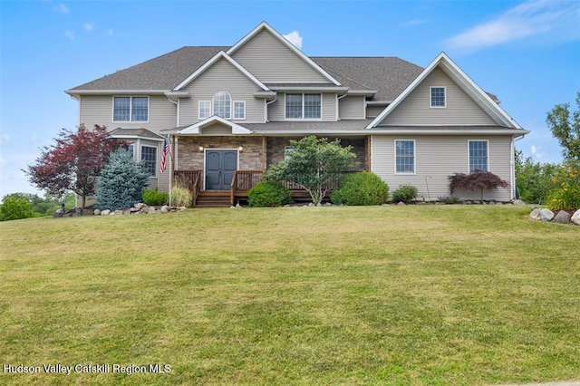 10 Sutton Ln, Goshen, NY 10924 - view of front of home with a front lawn and roof with shingles