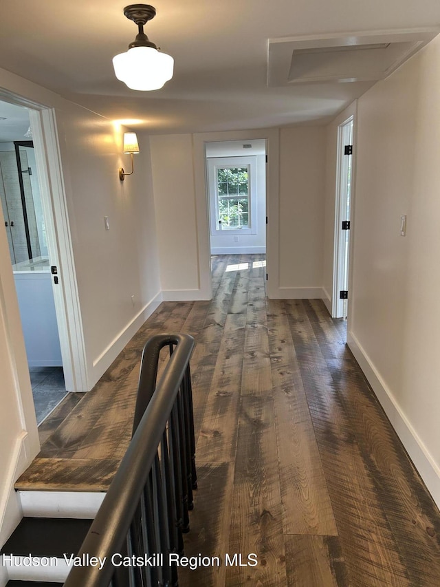 42 Ulster Ave, Saugerties, NY 12477 - hall with dark wood-type flooring and baseboards