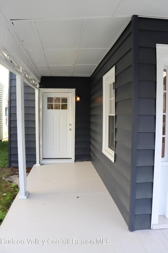 42 Ulster Ave, Saugerties, NY 12477 - doorway to property featuring covered porch
