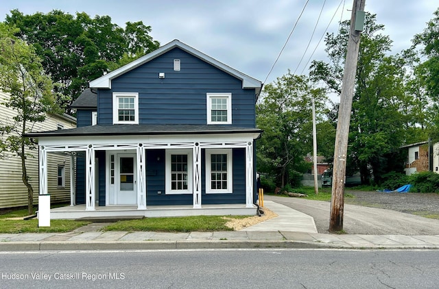 42 Ulster Ave, Saugerties, NY 12477 - view of front of property with covered porch and roof with shingles