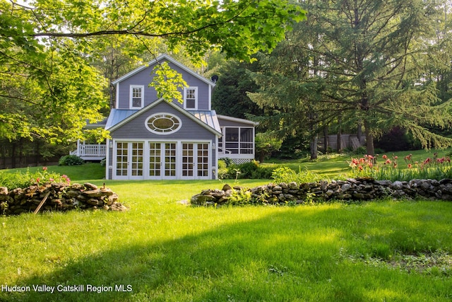 477 Fog Hill Rd, Austerlitz, NY 12017 - back of house with a sunroom and a yard