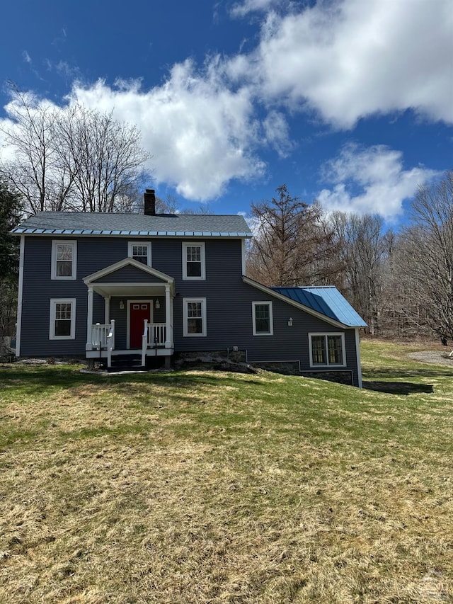 477 Fog Hill Rd, Austerlitz, NY 12017 - view of front of property featuring a chimney and a front lawn