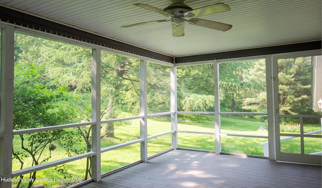 477 Fog Hill Rd, Austerlitz, NY 12017 - unfurnished sunroom featuring a ceiling fan and healthy amount of natural light