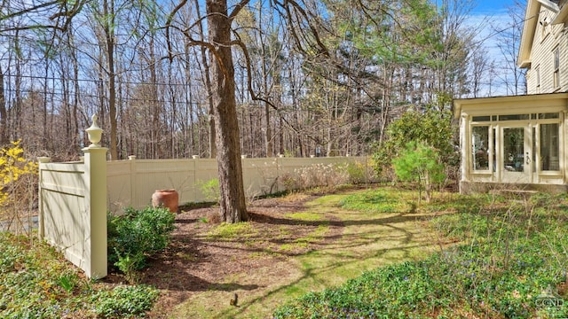 view of yard with fence