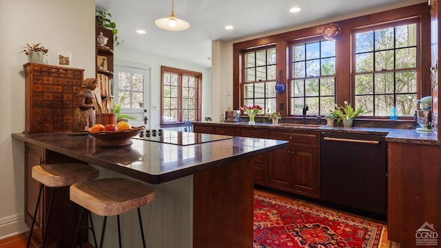 bar area featuring dishwasher, black electric stovetop, a sink, plenty of natural light, and recessed lighting