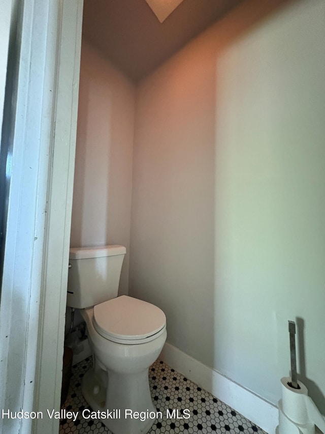 3766 US Route 9, Hudson, NY 12534 - bathroom featuring toilet, tile patterned flooring, and baseboards
