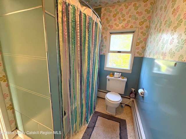 3766 US Route 9, Hudson, NY 12534 - bathroom featuring wallpapered walls, a baseboard radiator, toilet, and a shower with shower curtain