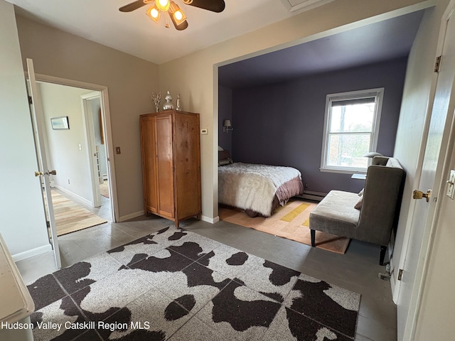 3766 US Route 9, Hudson, NY 12534 - bedroom with ceiling fan, light tile patterned flooring, baseboards, and a baseboard radiator