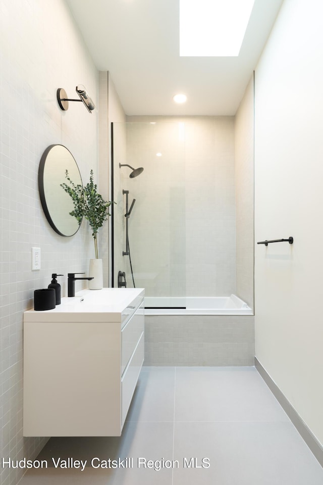8 Accurso Rd, Saugerties, NY 12477 - bathroom with tile patterned floors, vanity, tile walls, and tiled shower / bath