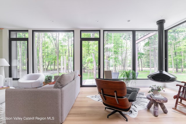 8 Accurso Rd, Saugerties, NY 12477 - living area with floor to ceiling windows and light wood-style floors