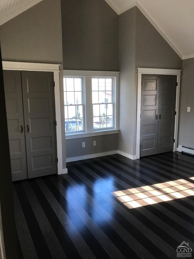 11293 Rte 32, Greenville, NY 12083 - entryway featuring vaulted ceiling, dark wood-style flooring, ornamental molding, and baseboard heating