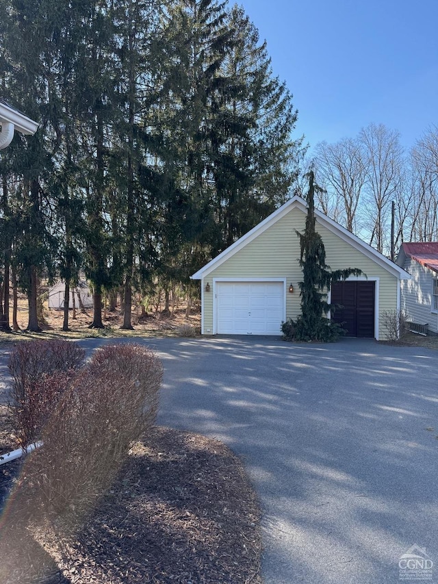 11293 Rte 32, Greenville, NY 12083 - view of property exterior with a garage and an outbuilding