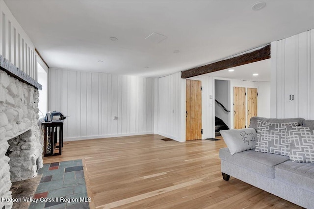 living room with light hardwood / wood-style flooring