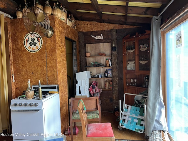 interior space with carpet and white gas range oven