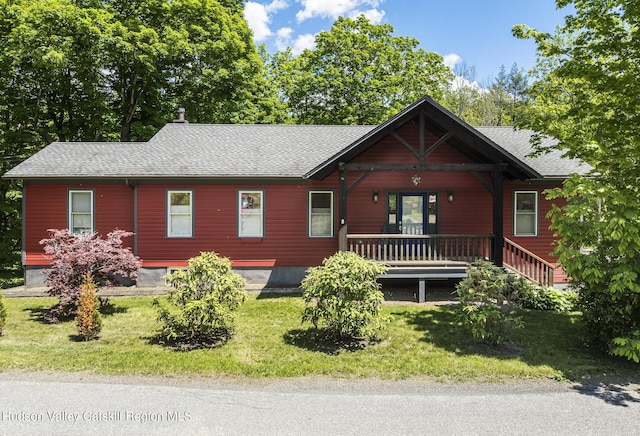 82 Near Rd, Red Hook, NY 12571 - chalet / cabin featuring covered porch, roof with shingles, and a front lawn