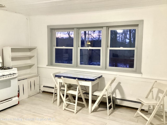 dining room with light wood-type flooring