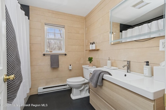 full bathroom featuring vanity, visible vents, baseboard heating, toilet, and tile patterned floors