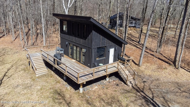 exterior space featuring a wooden deck