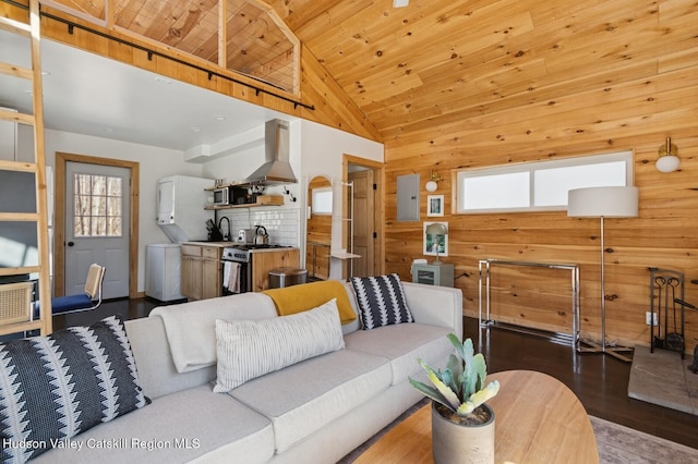 living area with electric panel, wood walls, high vaulted ceiling, wooden ceiling, and wood finished floors
