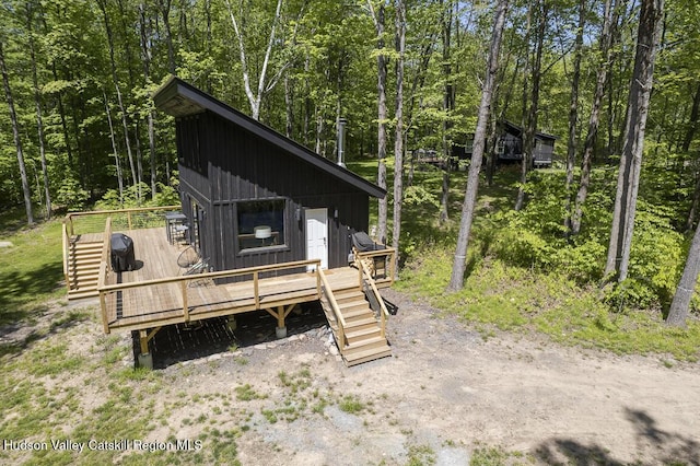 view of outbuilding with a wooded view