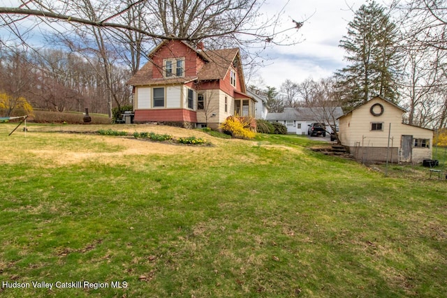 22 Hill St, Napanoch, NY 12458 - view of side of property featuring a lawn