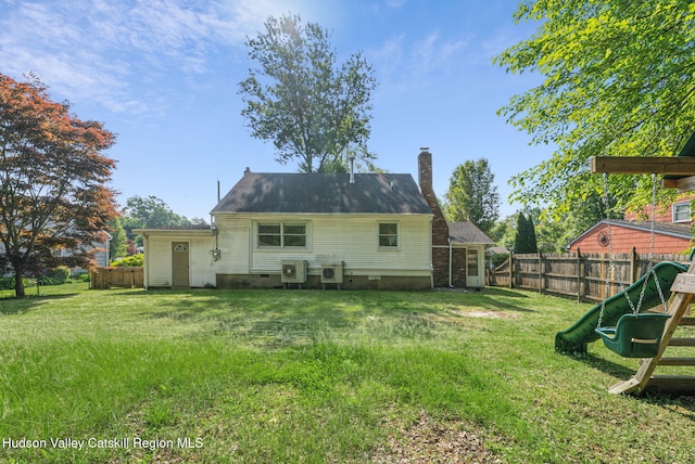 6 Stevens Ct, Saugerties, NY 12477 - back of house featuring crawl space, a chimney, and a playground