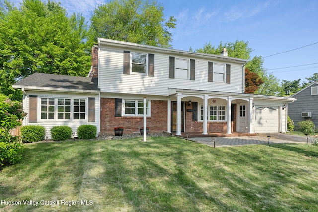 6 Stevens Ct, Saugerties, NY 12477 - view of front facade featuring covered porch, a chimney, a garage, and a front lawn