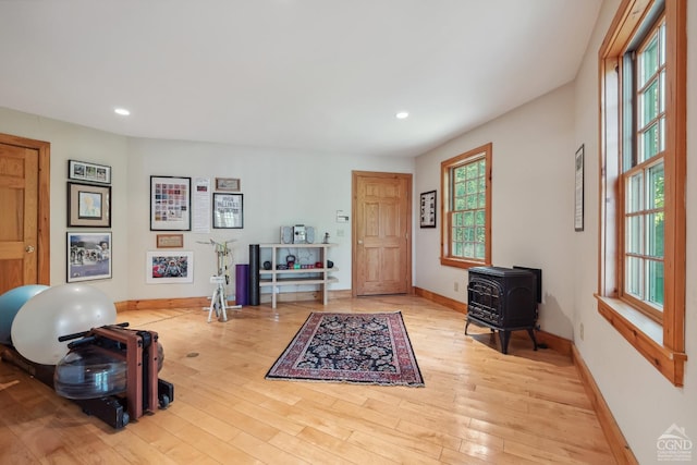 2205 County Route 5, Canaan, NY 12029 - exercise area with a wood stove, baseboards, wood finished floors, and recessed lighting