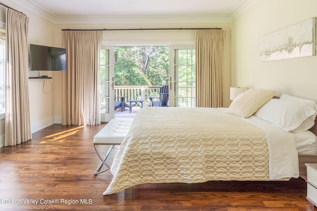 bedroom featuring crown molding, access to outside, and dark hardwood / wood-style flooring