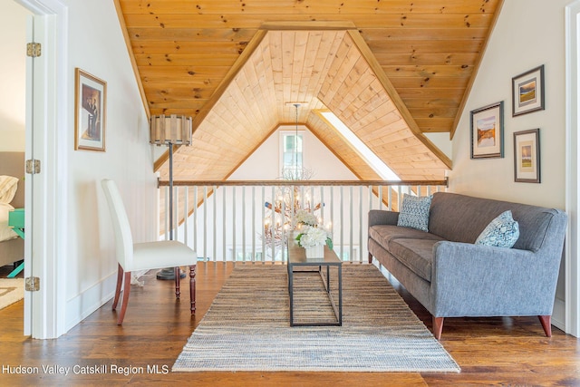 living area with vaulted ceiling, dark wood-type flooring, and wooden ceiling