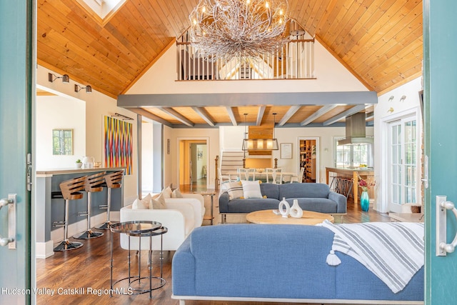 living room featuring a notable chandelier, wood-type flooring, high vaulted ceiling, and wooden ceiling